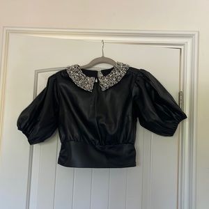 Black leatherette Evening beaded top. Never worn with tags